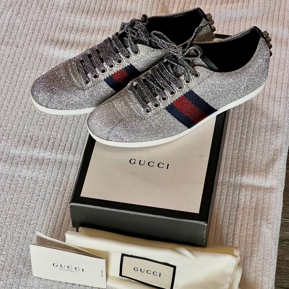 Gucci women’s Silver Glitter Sneakers with Red and Blue Stripes